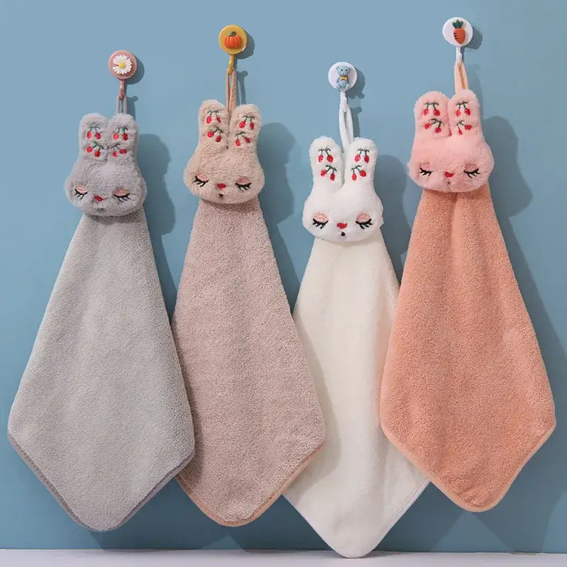 Four cartoon rabbit coral velvet hand towels in gray blush pink white and peach with embroidered cherry decorbites cartoon rabbit