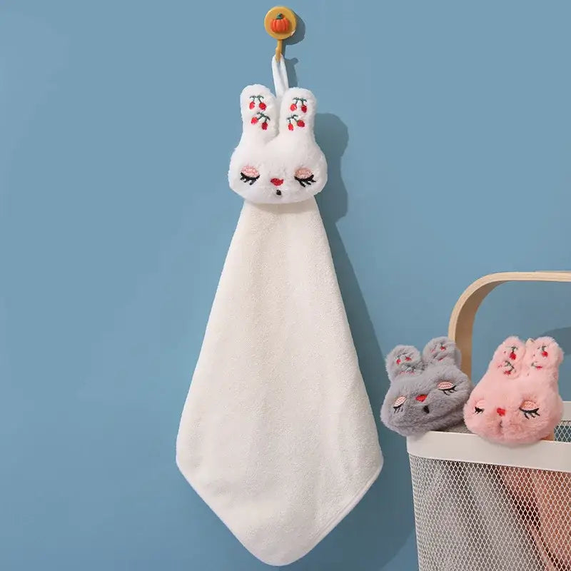 White plush hand towel shaped like a cartoon rabbit coral velvet with embroidered red berries for kitchen decorbites cartoon rabbit decor