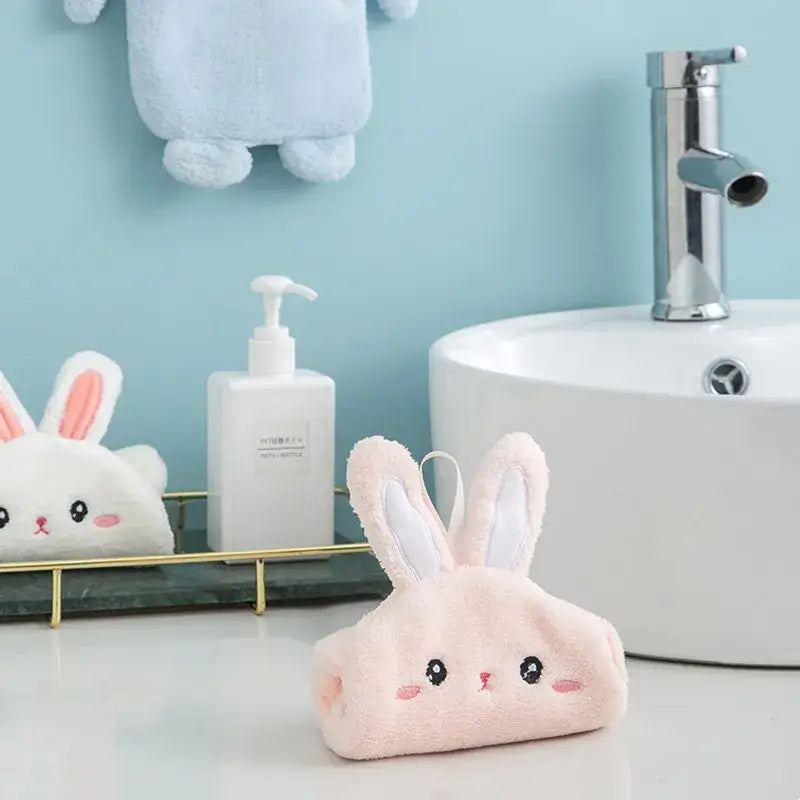 Pink plush bunny-shaped cartoon rabbit hand towel made of microfiber for bathroom decor by decorbites
