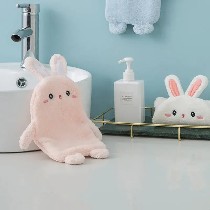 Pink plush bunny-shaped hand towel with embroidered face made of microfiber for decorbites cartoon rabbit bathroom decor