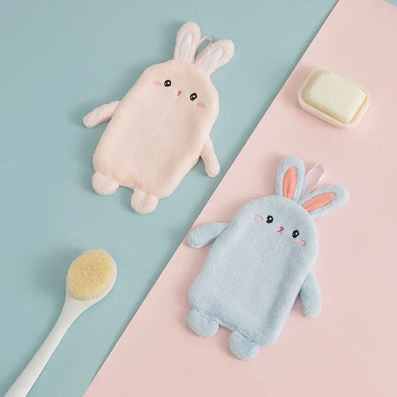 Soft pink and light blue plush microfiber hand towels shaped like cartoon rabbit with embroidered facial features for decorbites cartoon rabbit decor