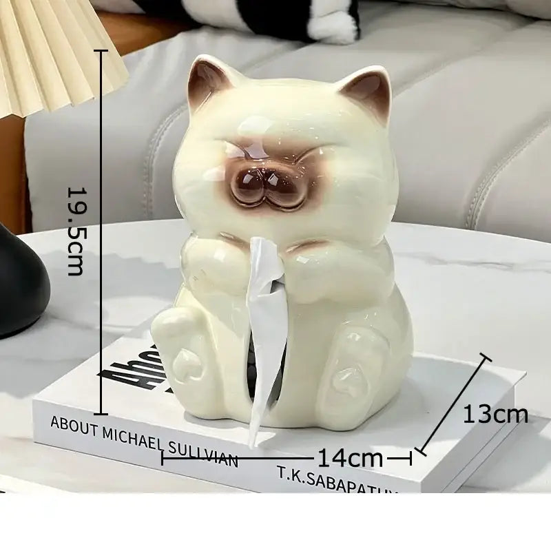 Cream-colored ceramic tissue box with brown accents in decorbites cartoon siamese kitten design for living room decor
