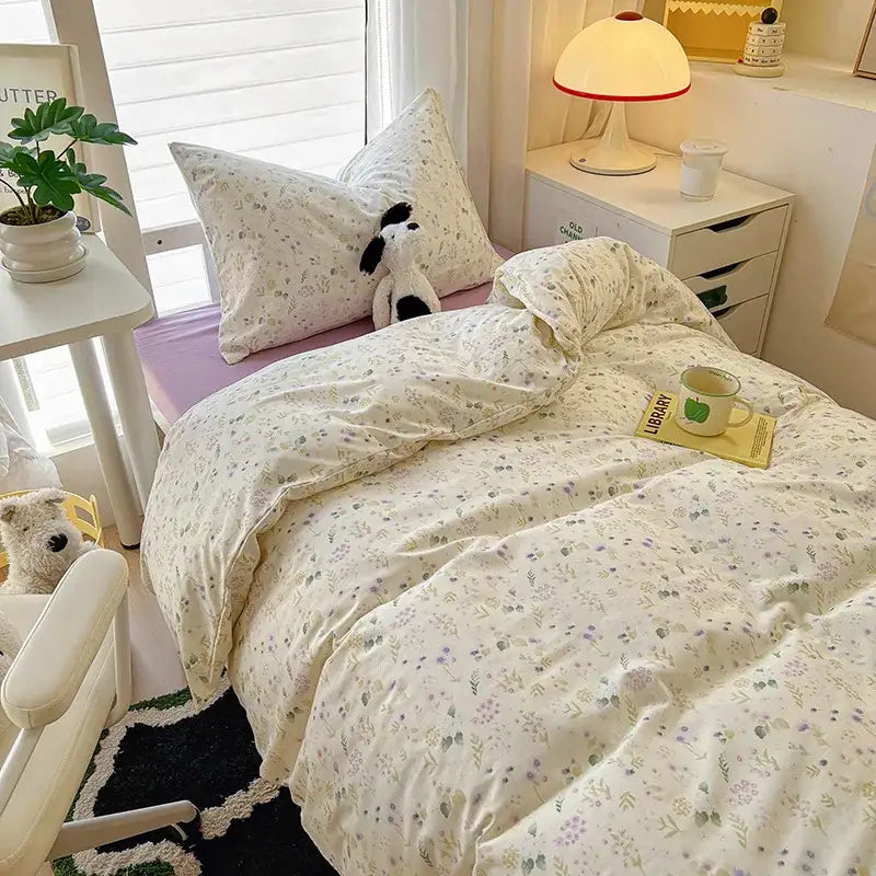 Cream-colored floral duvet set with pastel patterns in decorbites cartoon style cotton bedding sets for cozy bedrooms