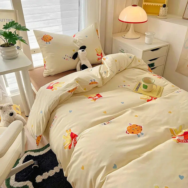 Cream-colored cotton bedding sets with playful cartoon style cookie and fries prints for cozy bedroom decorbites cartoon style