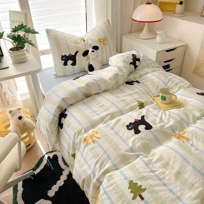 Cute white and light blue striped cartoon style cotton bedding set with black cat and yellow bow appliqués by decorbites
