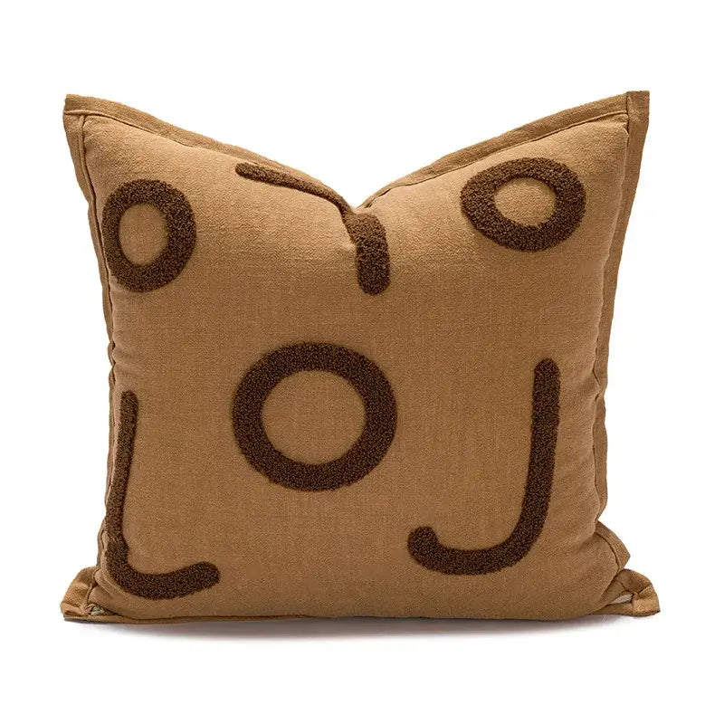 Tan cotton pillow cover featuring decorbites cartoon tiger embroidered whimsical face in dark brown textured lettering
