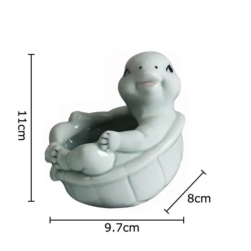 A charming light green cartoon turtle ceramic planter with a smiling face and detailed shell for living room decor