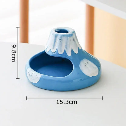 Blue ceramic volcanic ceramic ashtray shaped like Mount Fuji with white snow caps and glossy finish for office decorbites cartoon volcanic use