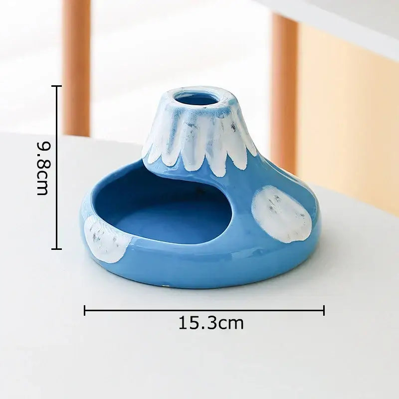 Blue ceramic volcanic ceramic ashtray shaped like Mount Fuji with white snow caps and glossy finish for office decorbites cartoon volcanic use