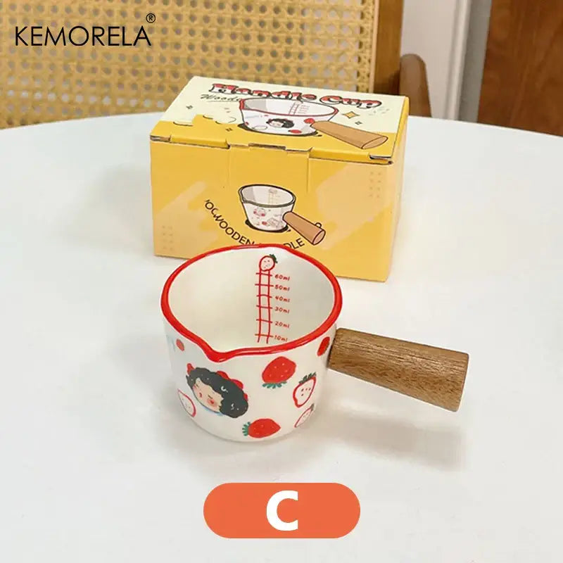 White italian ceramic measuring cup with red rim wooden handle and strawberry decorbites italian ceramic design