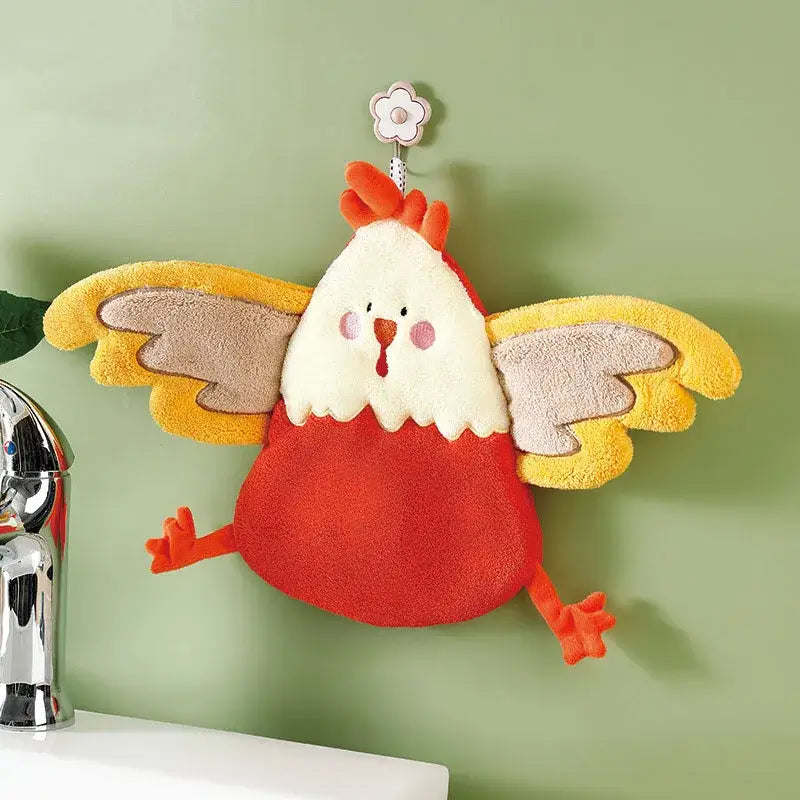 A coral velvet cartoon chicken hand towel holder in red white and yellow hanging from a decorative flower hook for kitchen decorbites coral velvet