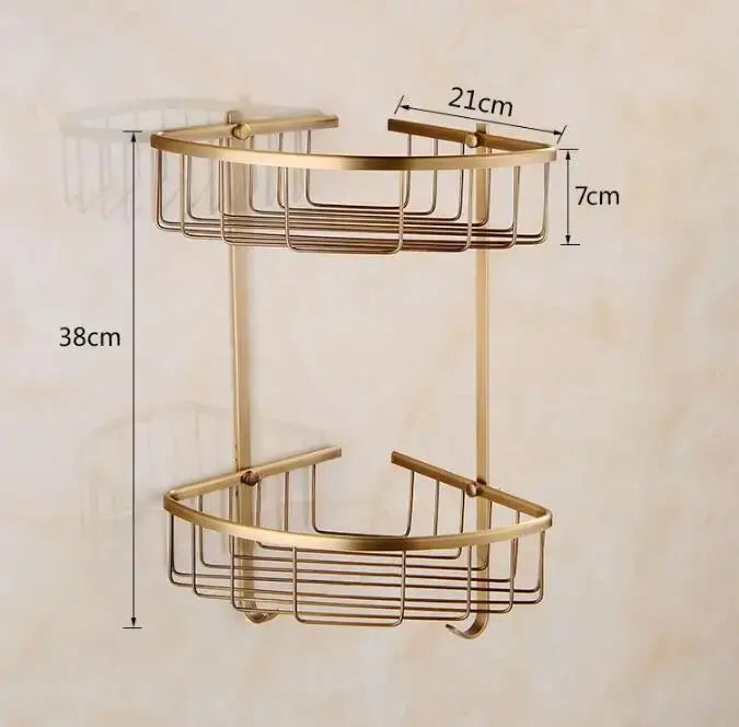 Gold-toned double-tier corner shower caddy with wire mesh design and curved edges in carved antique bronze brass decorbites set