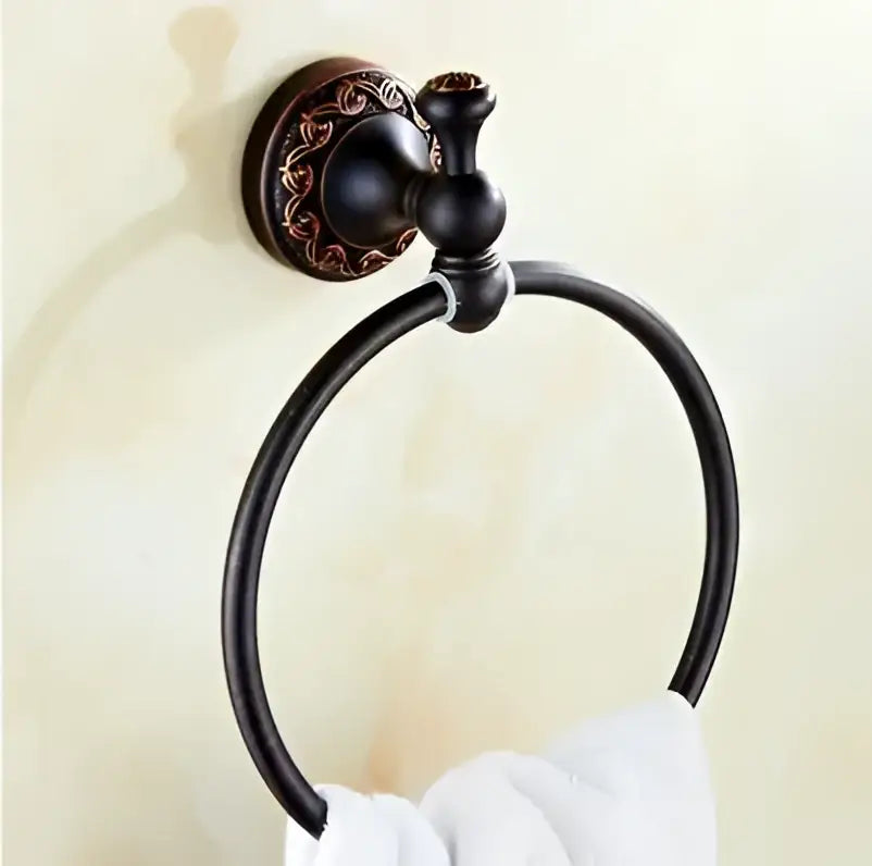 Antique bronze-finished towel ring with ornate heart-patterned plate in decorbites carved flowers blackened copper set