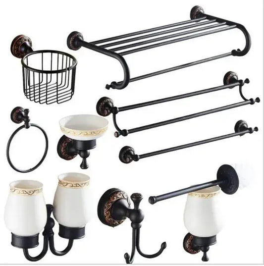 Black metal bathroom accessory set with carved flowers blackened copper and white ceramic cups with gold trim by decorbites