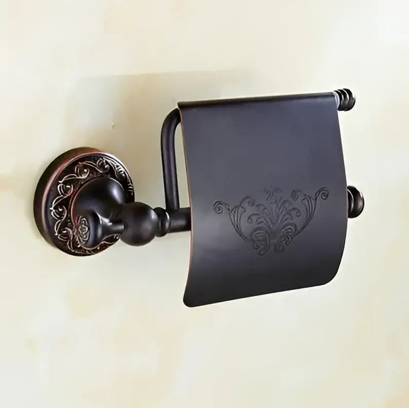 Antique bronze toilet paper holder with ornate scrollwork and etched floral pattern in decorbites carved flowers blackened copper set