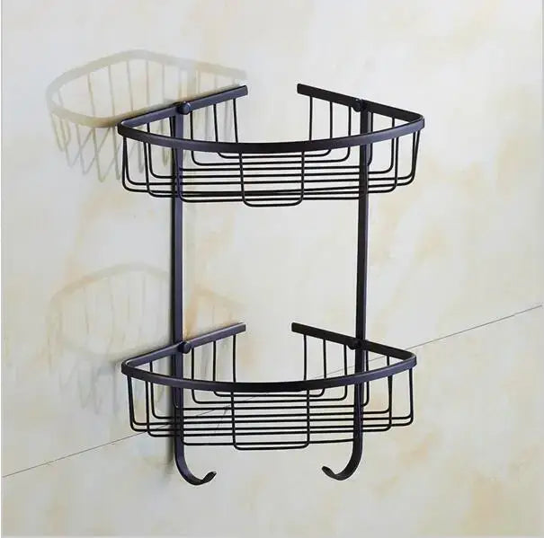 Black metal two-tier corner shower caddy with curved wire mesh shelves and hook ends from decorbites carved flowers blackened copper set
