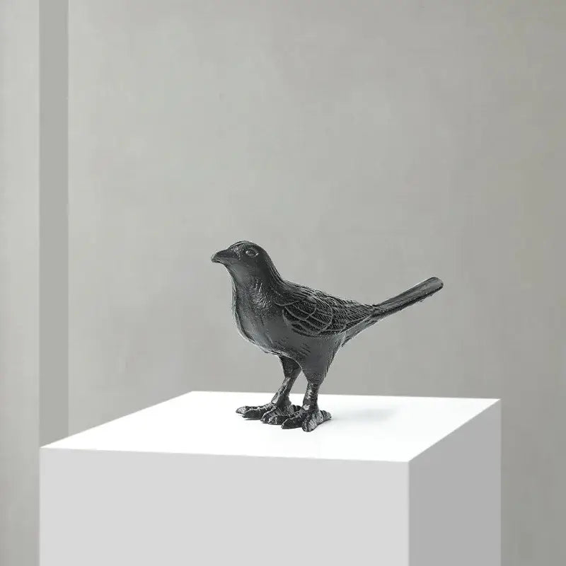 Black matte iron bird decoration with detailed feather texture standing posture for elegant living room display
