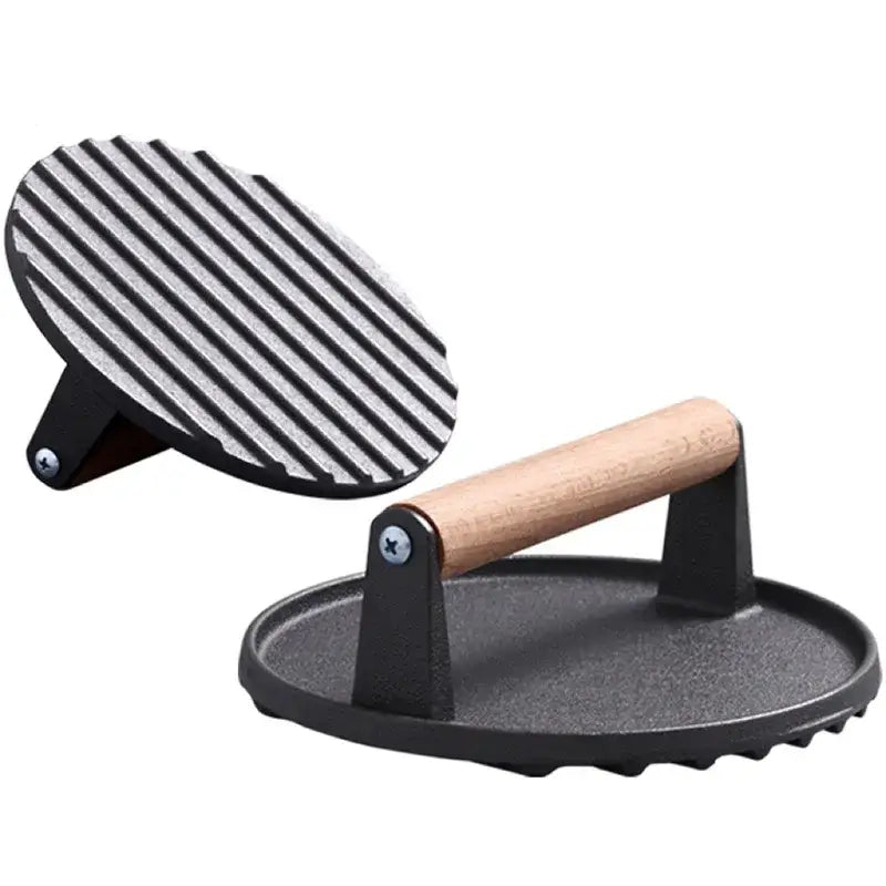 Black cast iron steak press plate with ribbed grilling surface and wooden handle kitchen tool for grilling burgers