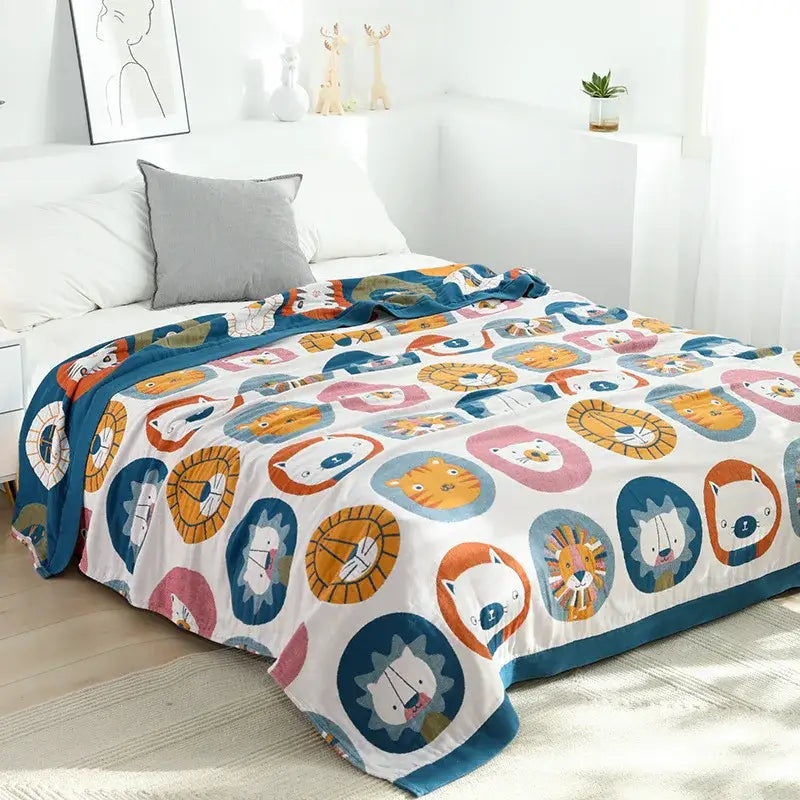 A cozy white pure cotton gauze towel blanket with colorful cat cartoon animal lions pattern for bedroom decorbites decor