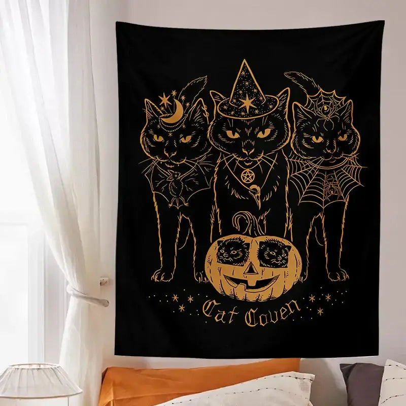 Black tapestry decorbites cat coven with three gold foil outlined cats witch hats spiderwebs and jack o lantern wall art