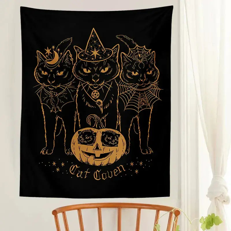 Black tapestry featuring three stylized black cats with gold foil details and a carved pumpkin for cat coven witchcraft decorbites cat coven wall art