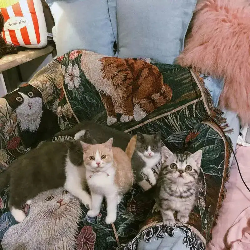 A dark green decoarbites cat sunflower knitted sofa cover featuring embroidered cats and floral patterns for living room decor