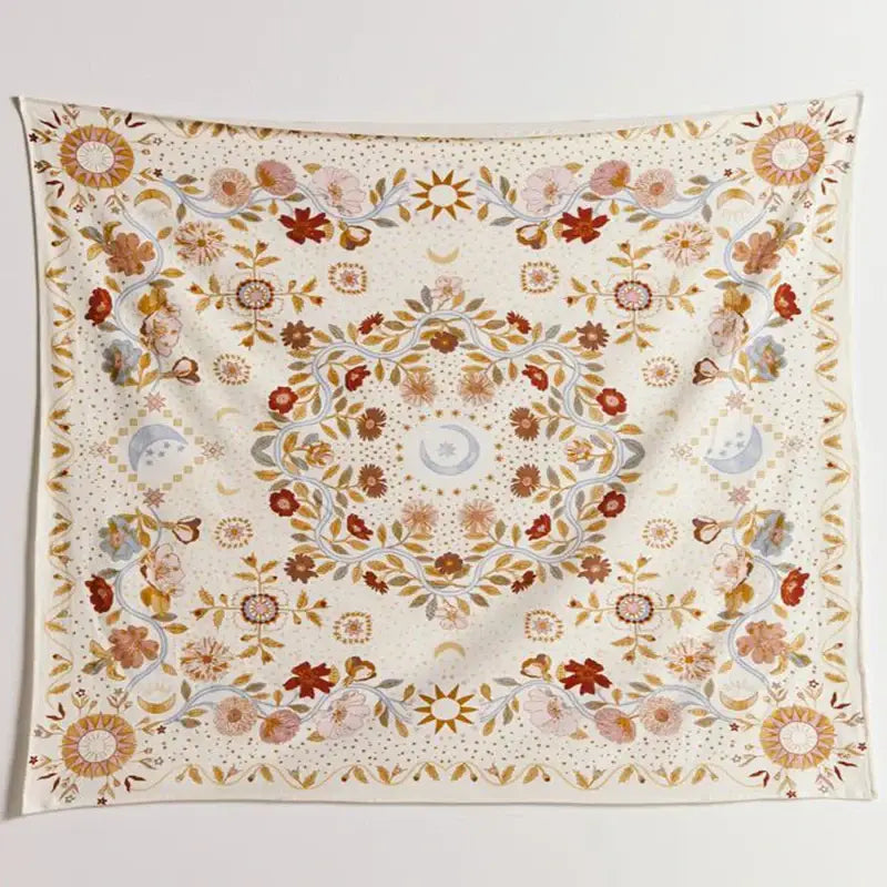 A cream-colored decorbites celestial floral moon phase tapestry with intricate suns moons flowers and vines design