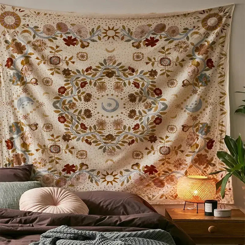 A cream-colored decorbites celestial floral tapestry with moon phase suns moons and vines for bedroom wall decor