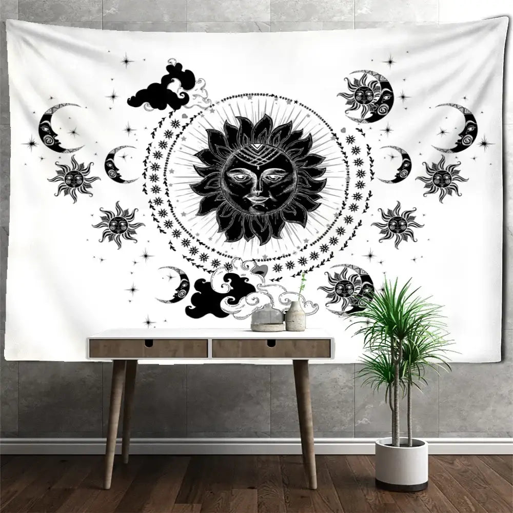 Black and white celestial mandala hippie wall hanging featuring sun with face surrounded by moons stars and clouds decorbites celestial mandala decor