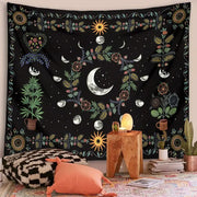 Black tapestry featuring intricate silver moons suns stars on a dark background for decorbites celestial moon phase floral wall hanging