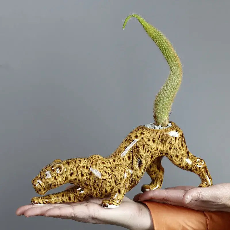 Ceramic animal flowerpot leopard with glossy tan and brown finish and green cactus by decorbites ceramic animal decor