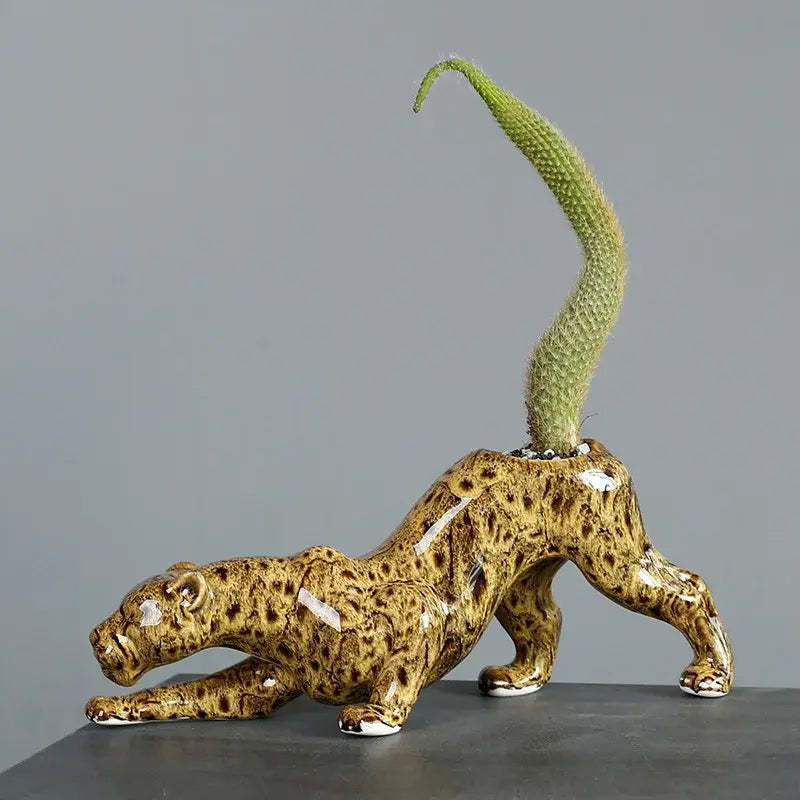 Decorbites ceramic animal flowerpot shaped like a speckled brown leopard with a green cactus for garden decor