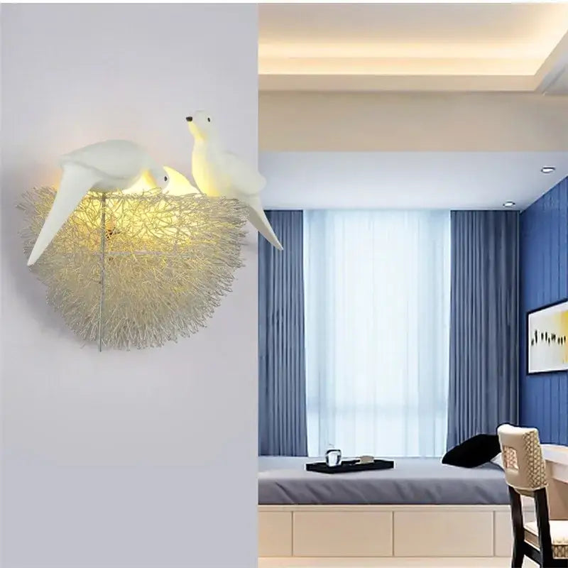 White ceramic dove led wall lamp with glowing textured golden wire nest for bedroom sconce lighting