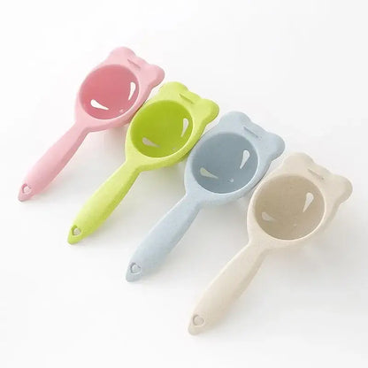 Set of four pastel-colored bear-shaped eggs holder separators made of smooth plastic for decorbites boiled eggs