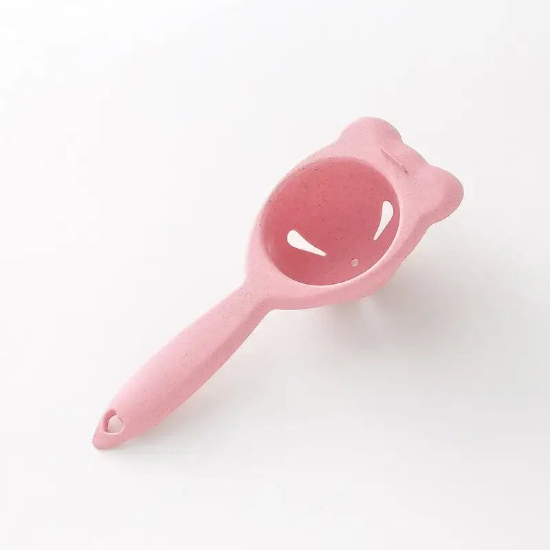Pink silicone cat-shaped egg holder separator with cute ears and whisker cutouts for decorbites boiled eggs use