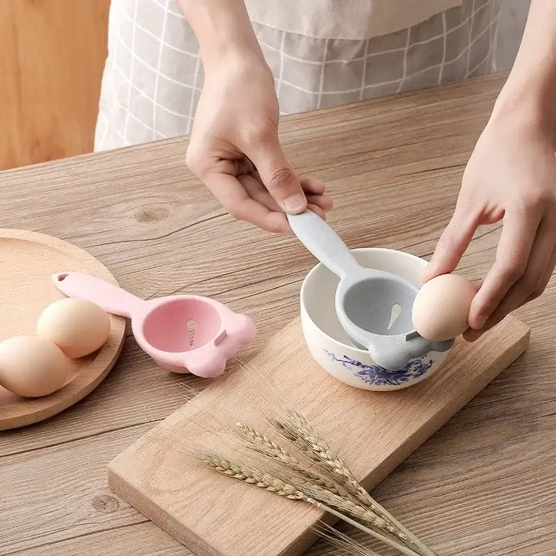 Light blue plastic egg holder separator with smooth handle for easy yolk separation in decorbites boiled eggs kitchen tool