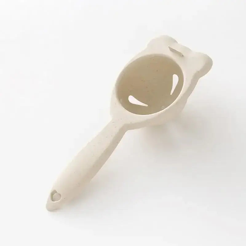 Beige ceramic eggs holder separator with bear-shaped top and smooth handle for decorbites boiled eggs kitchen use