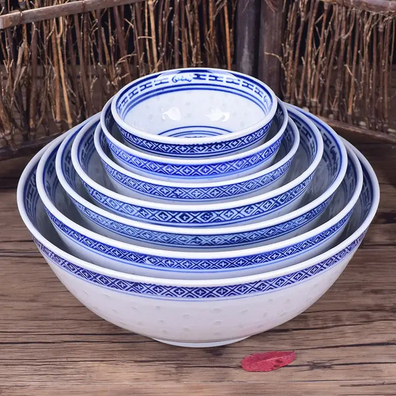Set of five nested ceramic dragon print bowls in blue and white featuring traditional geometric patterns for dining decorbites ceramic dragon