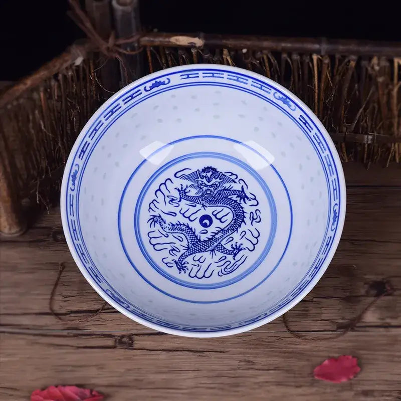 White ceramic bowl with blue decorbites ceramic dragon print and yin-yang design for dining room dishes