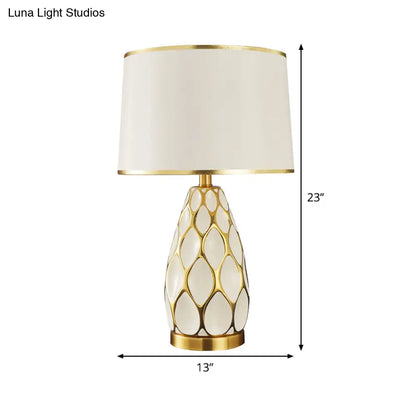 Ceramic Drum Table Lamp: Modern White Night Light for Living Room with Fabric Shade