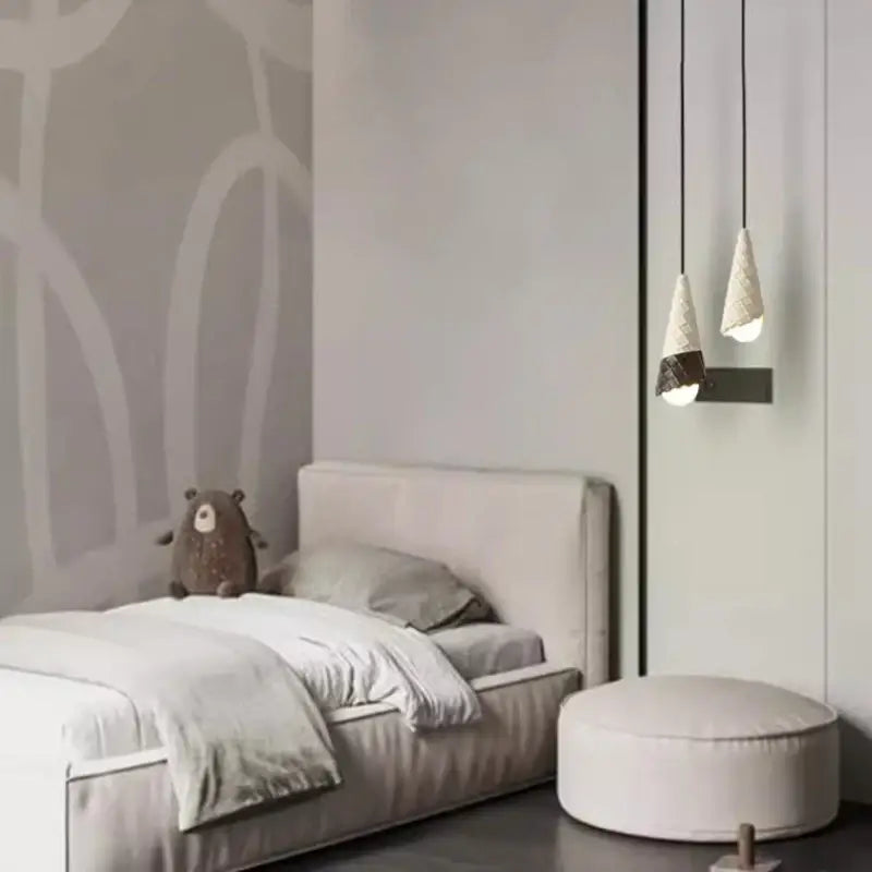 Modern ceramic ice cream pendant light with conical textured shades in white and black featuring led bulb for nursery