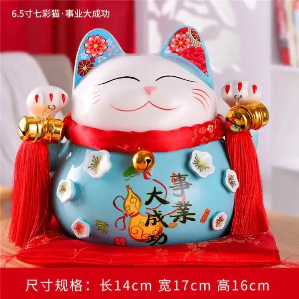Ceramic maneki neko blue lucky cat piggy bank with red accents gold bells and floral ear decor for living room decorbites ceramic maneki