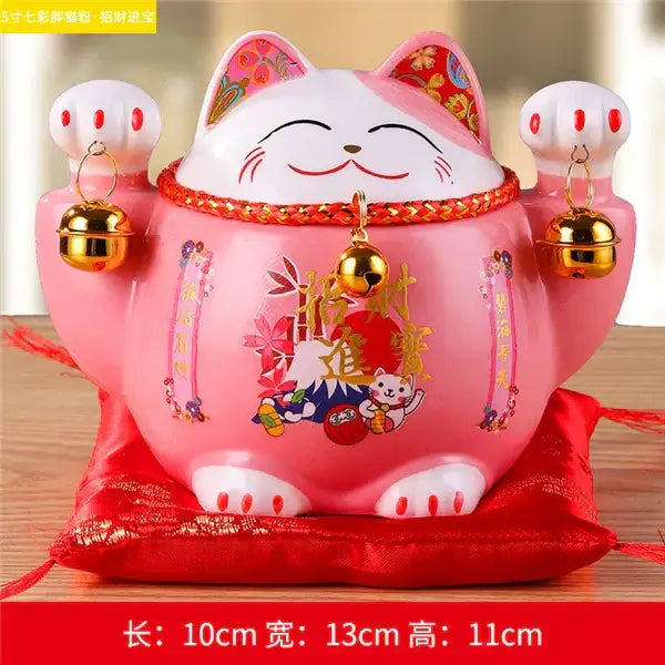 Pink ceramic maneki neko piggy bank with gold bells and red accents decorbites ceramic maneki for living room decor