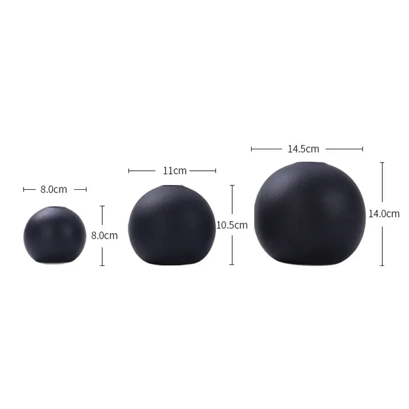 Set of three matte black ceramic round vases in varying sizes for vase black white decor collection