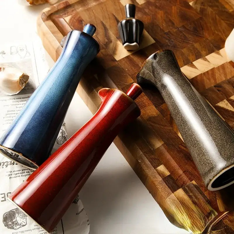 Three ceramic seasoning pots with glossy gradient finishes in blue red and gray from decorbites ceramic seasoning set