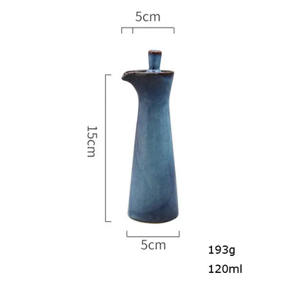 A sleek 15cm ceramic seasoning pot with matte blue glaze and dark brown lid by decorbites ceramic seasoning