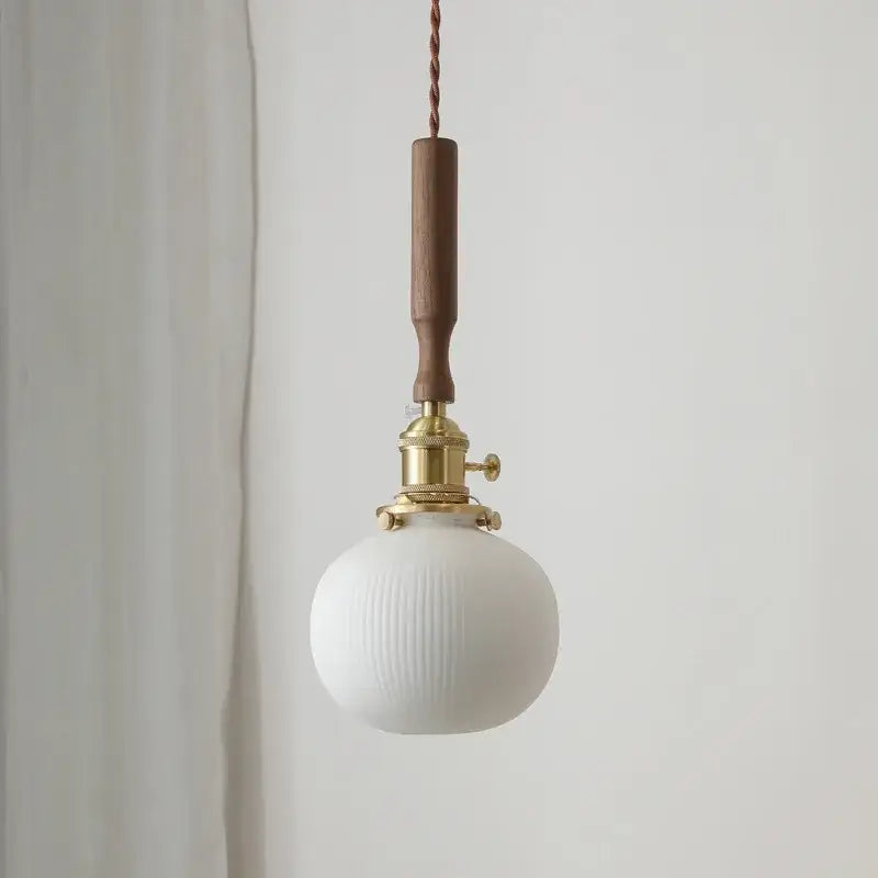 White ribbed glass pendant light with brass fixture and wooden handle from decorbites ceramic walnut copper collection