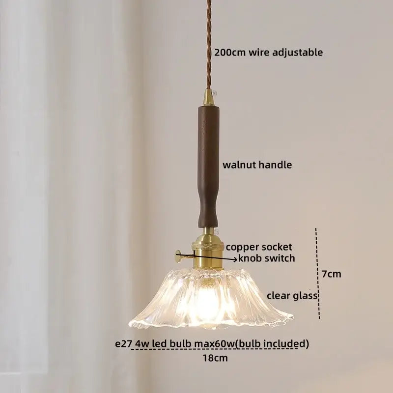 Ceramic walnut copper pendant light with a warm-toned walnut handle, copper socket, and clear ribbed glass shade decorbites ceramic walnut
