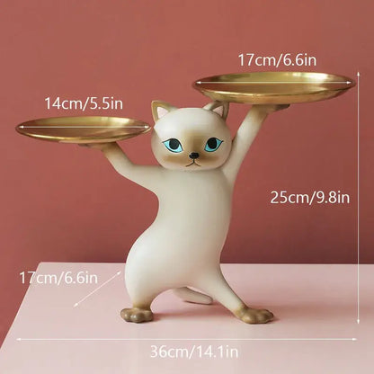Cream-colored ceramic cat figurine with blue eyes holding gold-plated trays for cat figurines storage tray use