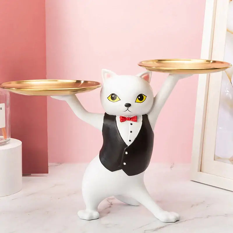 White ceramic cat figurine in black tuxedo with red bow tie holding gold trays for cat figurines storage tray decor